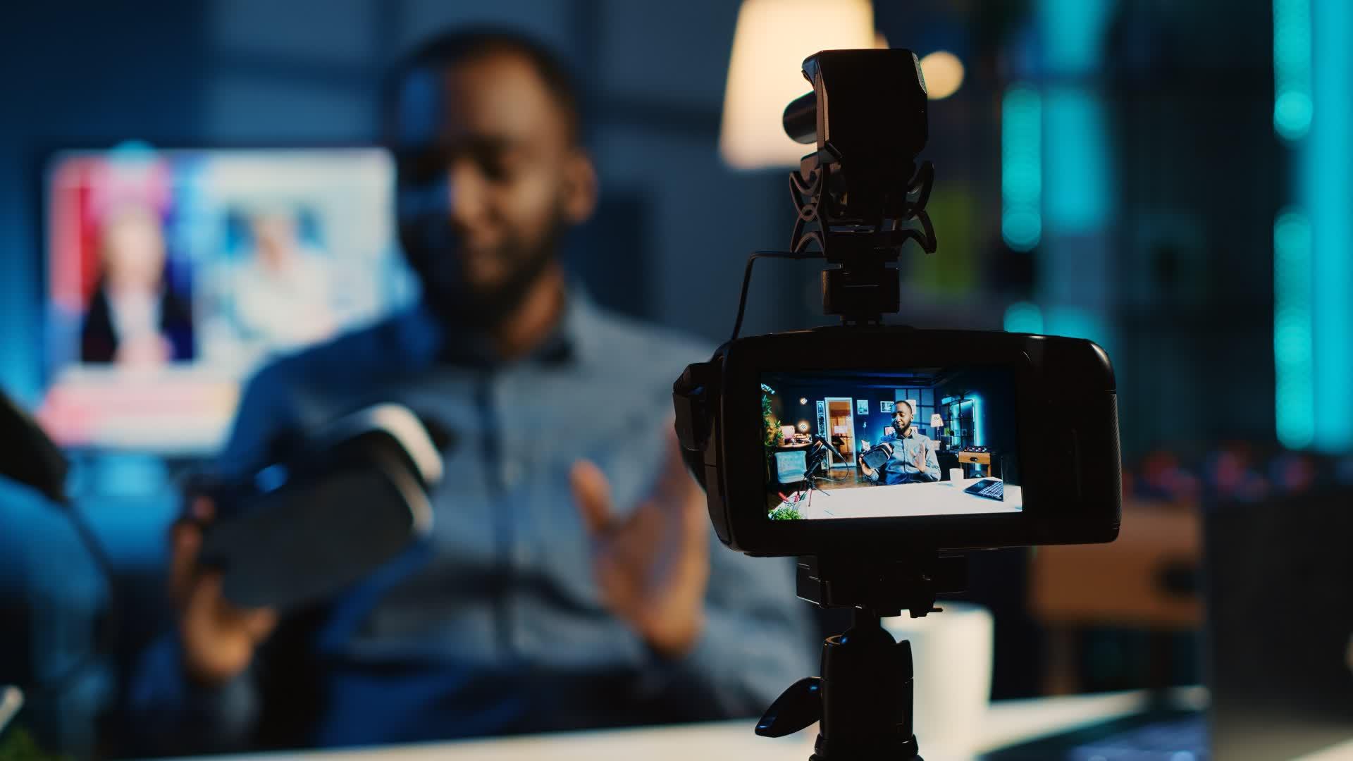 Creator presenting in front of a camera